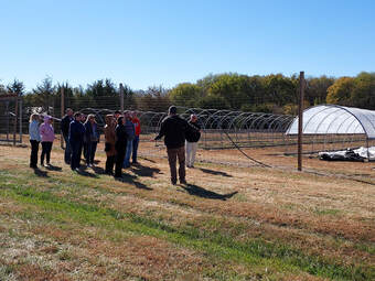 Dr. Cary Rivard leads NCR Administrators on a tour of OHREC research plots on October 18.